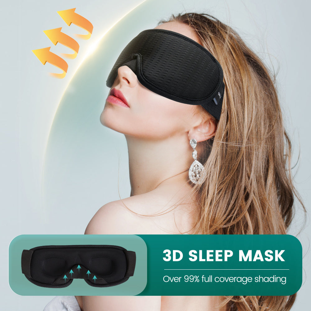 Woman wearing black 3D sleeping mask blocking light, breathable and adjustable for comfort.