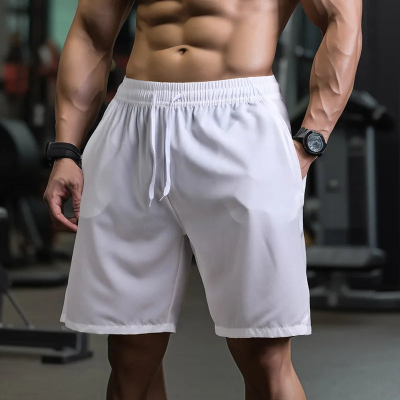 Men's breathable and quick-drying performance shorts with elastic waistband and deep side pockets for all sports.