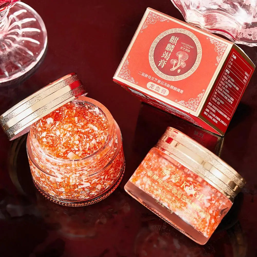 Dragon Blood Retinol Cream moisturizer jar and box with Korean skincare formula on dark surface