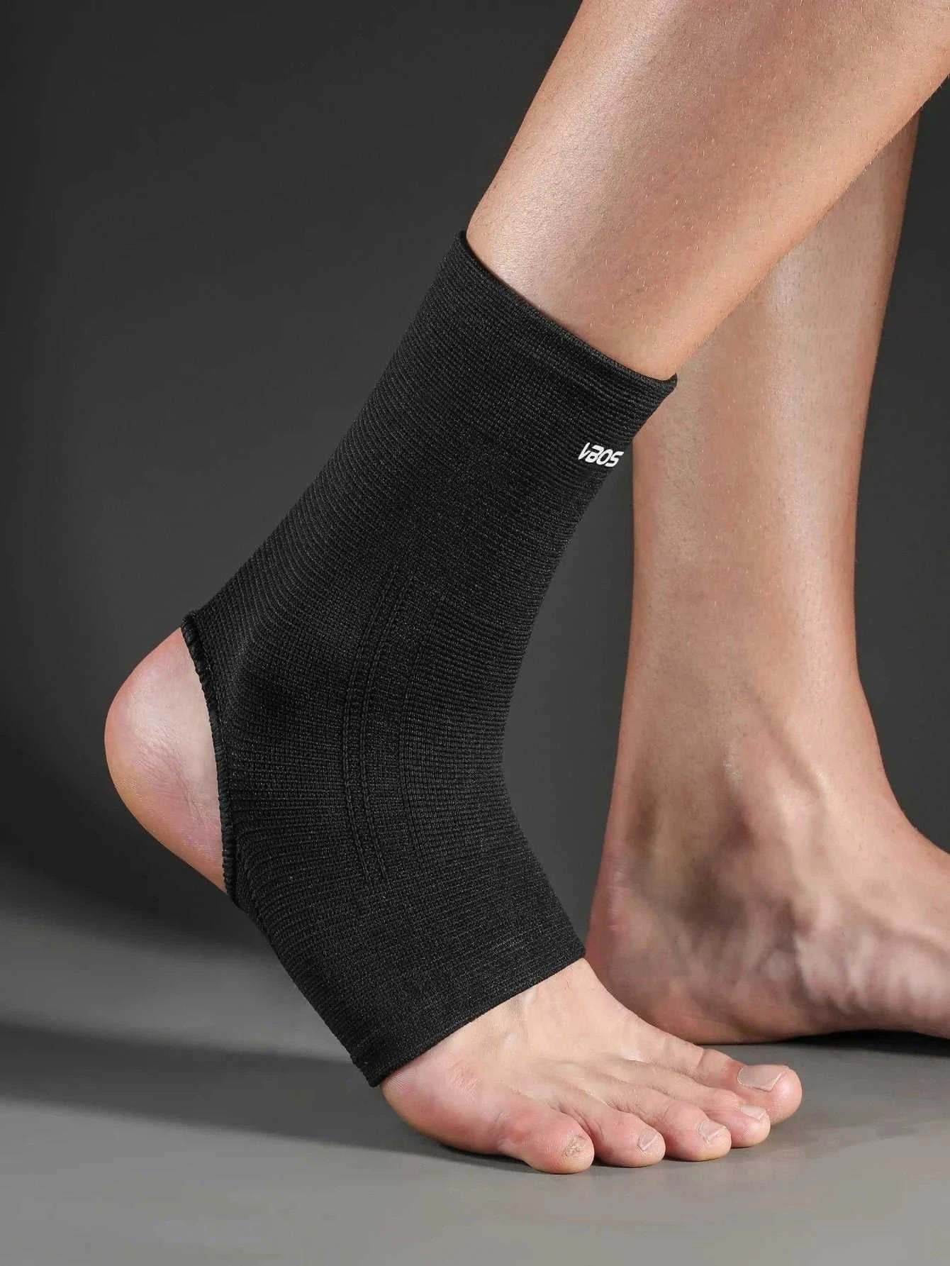 Elastic breathable ankle support brace on foot for injury prevention and daily comfort