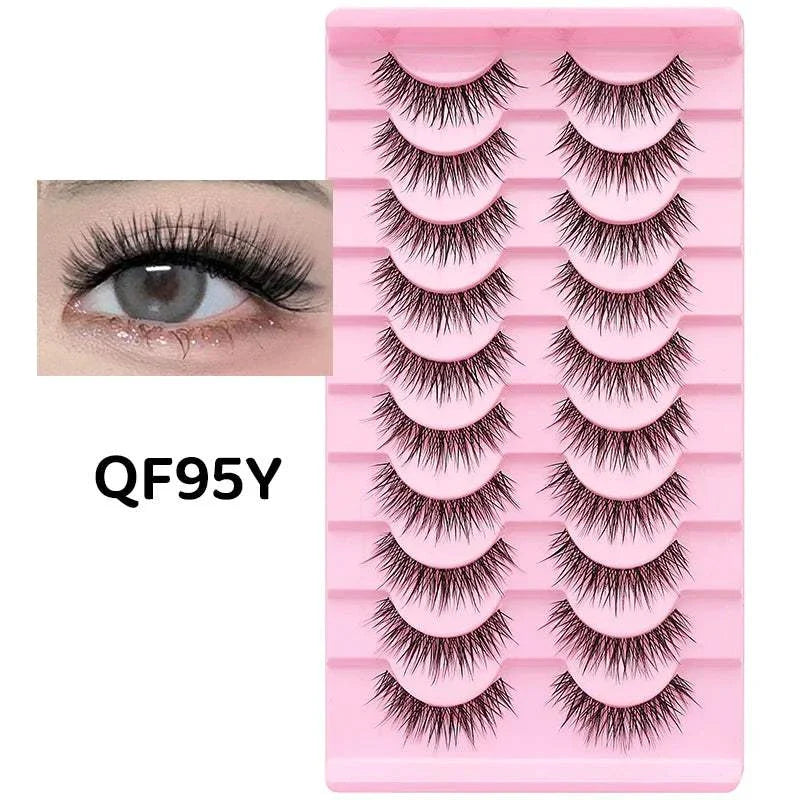 10 pairs of Natural Manga Full Strip Lashes in pink tray with close-up eye showing voluminous anime-inspired eyelash look