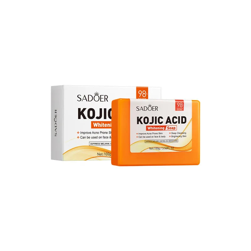 SADOER Kojic Acid Facial Soap bar with whitening and acne improvement benefits in orange packaging next to its white box