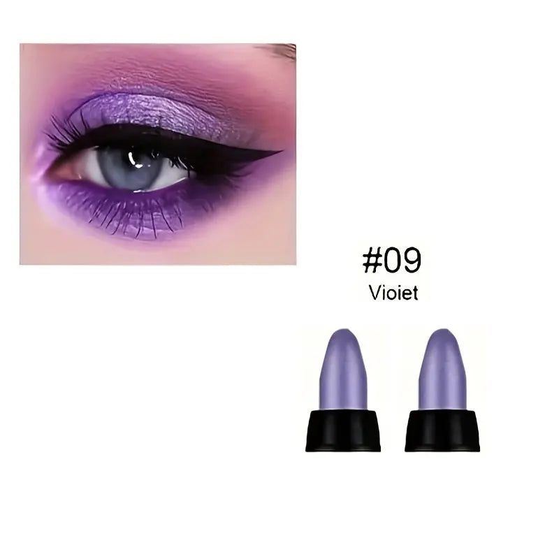 Close-up of eye makeup featuring pearlescent violet glitter eyeliner with two violet eyeliner tips from 16-color pearlescent glitter eyeliner set