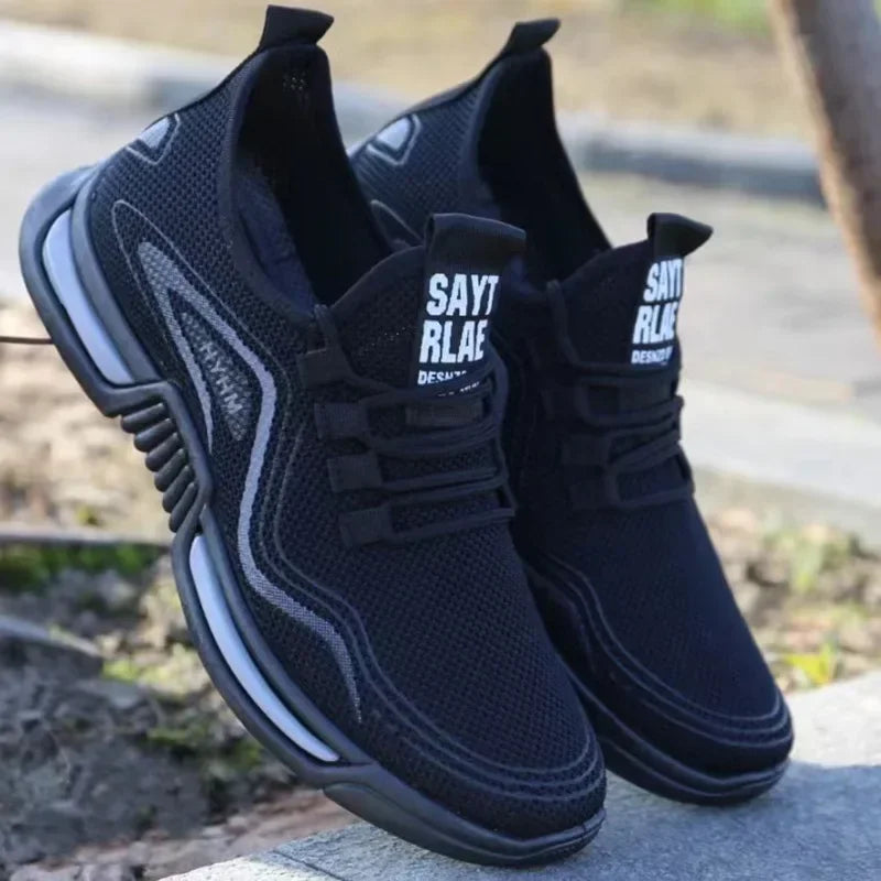 Black men shoes slip on fashion sneakers with breathable mesh upper and lightweight sole for comfort and style.