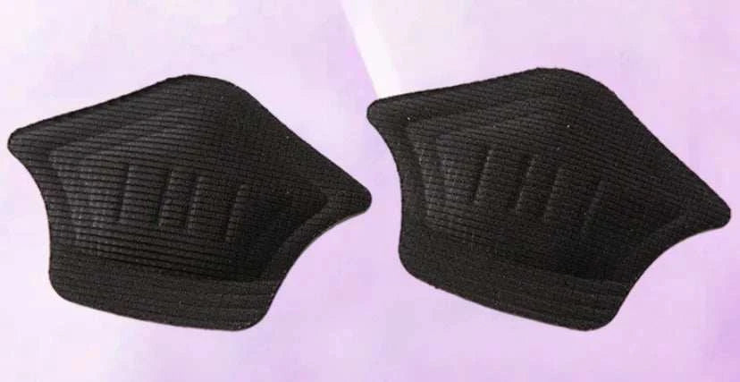 Pair of black heel cushion pads for shoe comfort and protection against blisters and irritation