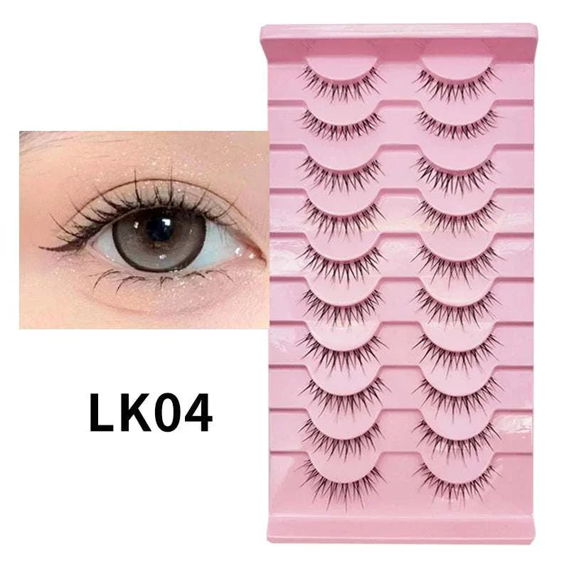 10 pairs of natural manga full strip lashes in pink tray with close-up of eye applying lashes
