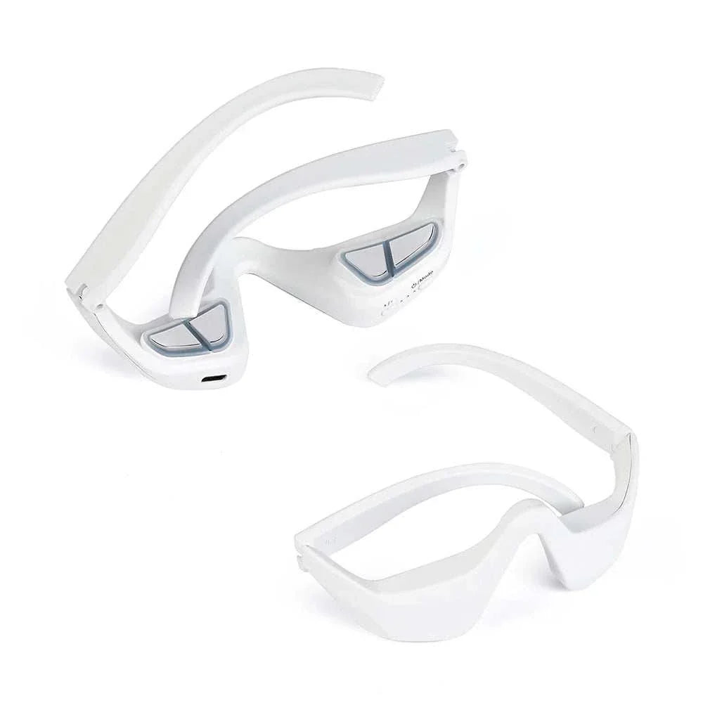 white rechargeable 3D eye massager with heat and vibration modes for soothing eye care and reduction of dark circles and fine lines