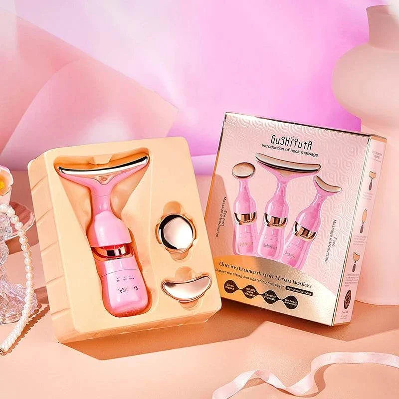 3-in-1 Facial Lifting Device with neck, face, and eye massage heads in pink, featuring EMS microcurrent technology and LED light therapy, packaged in a box.