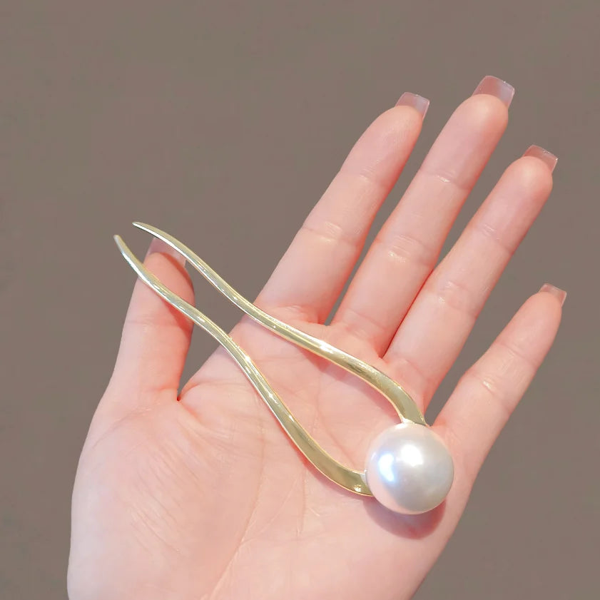 Pearl U-Shaped Hairpin with metallic shell and large pearl for elegant hairstyles