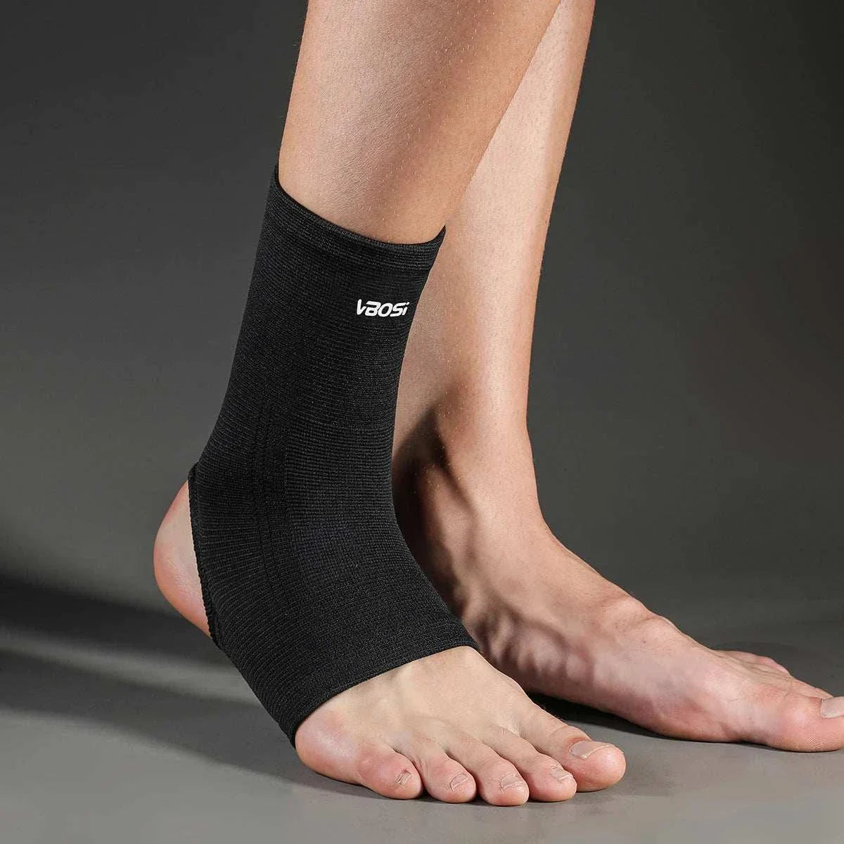 Elastic breathable ankle support brace on foot providing compression and comfort for sports and daily wear