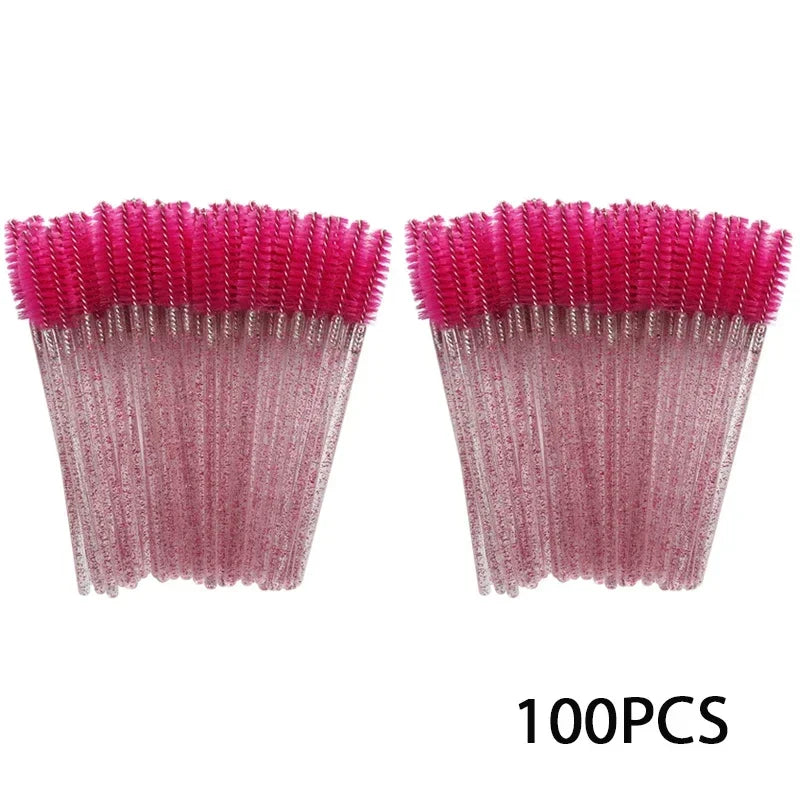 100 disposable mascara and eyebrow brushes with pink spiral bristles and clear handles