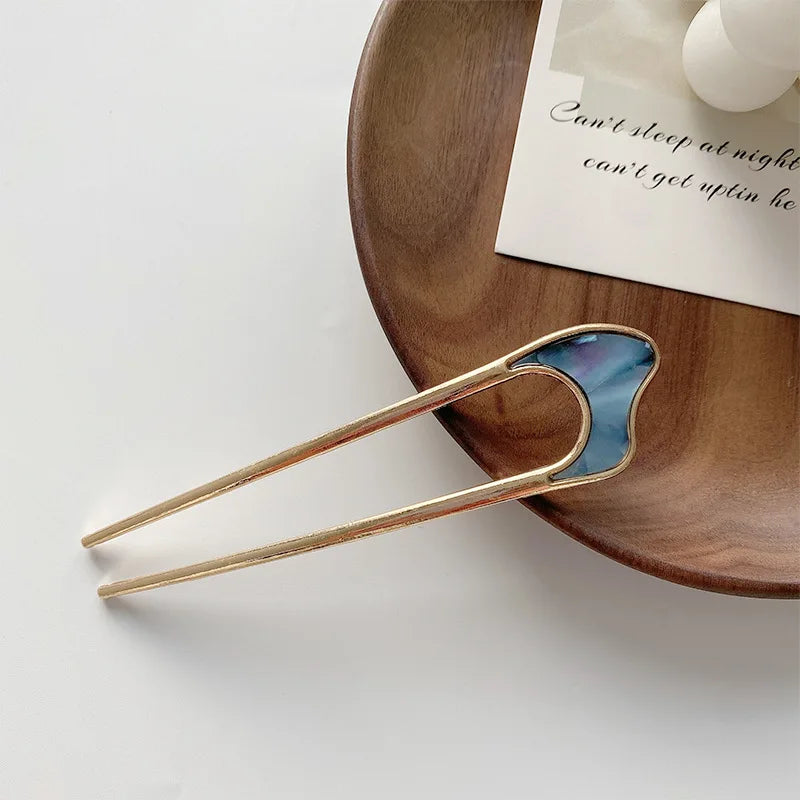 Elegant New Pearl U-Shaped Hairpin with blue shell detail on wooden plate