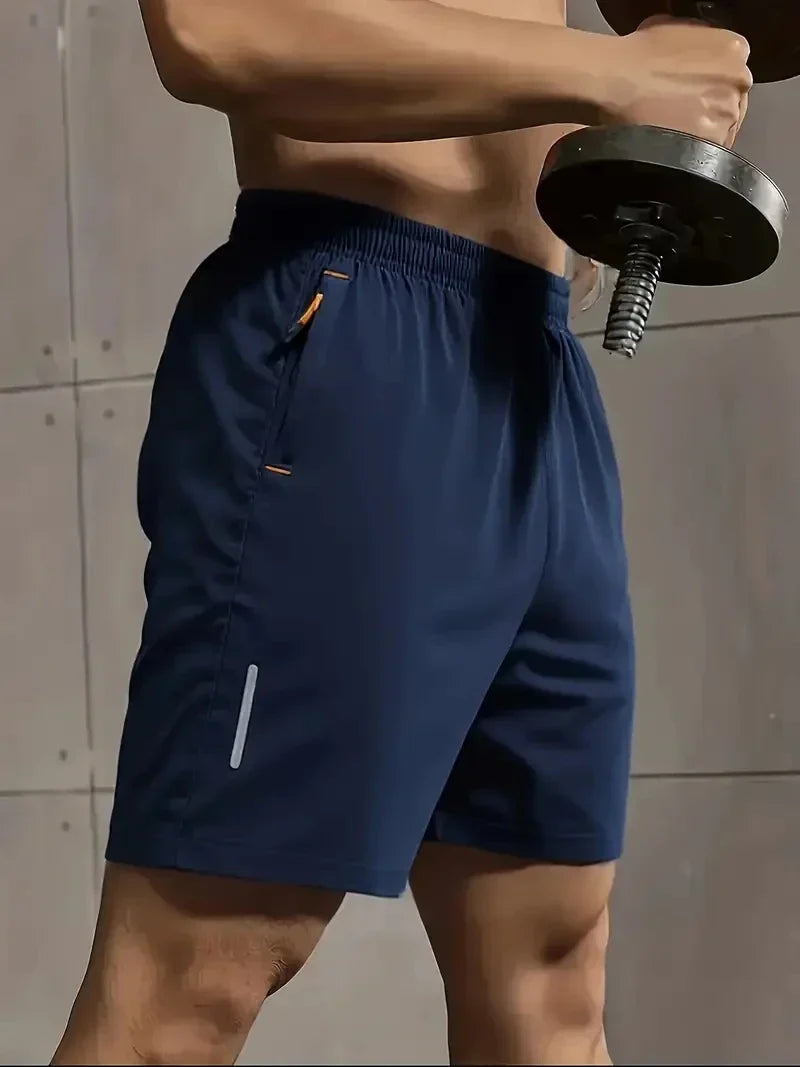 Men’s breathable sports shorts in navy blue with elastic waistband, lightweight fabric, and quick-dry technology for summer workouts and casual wear