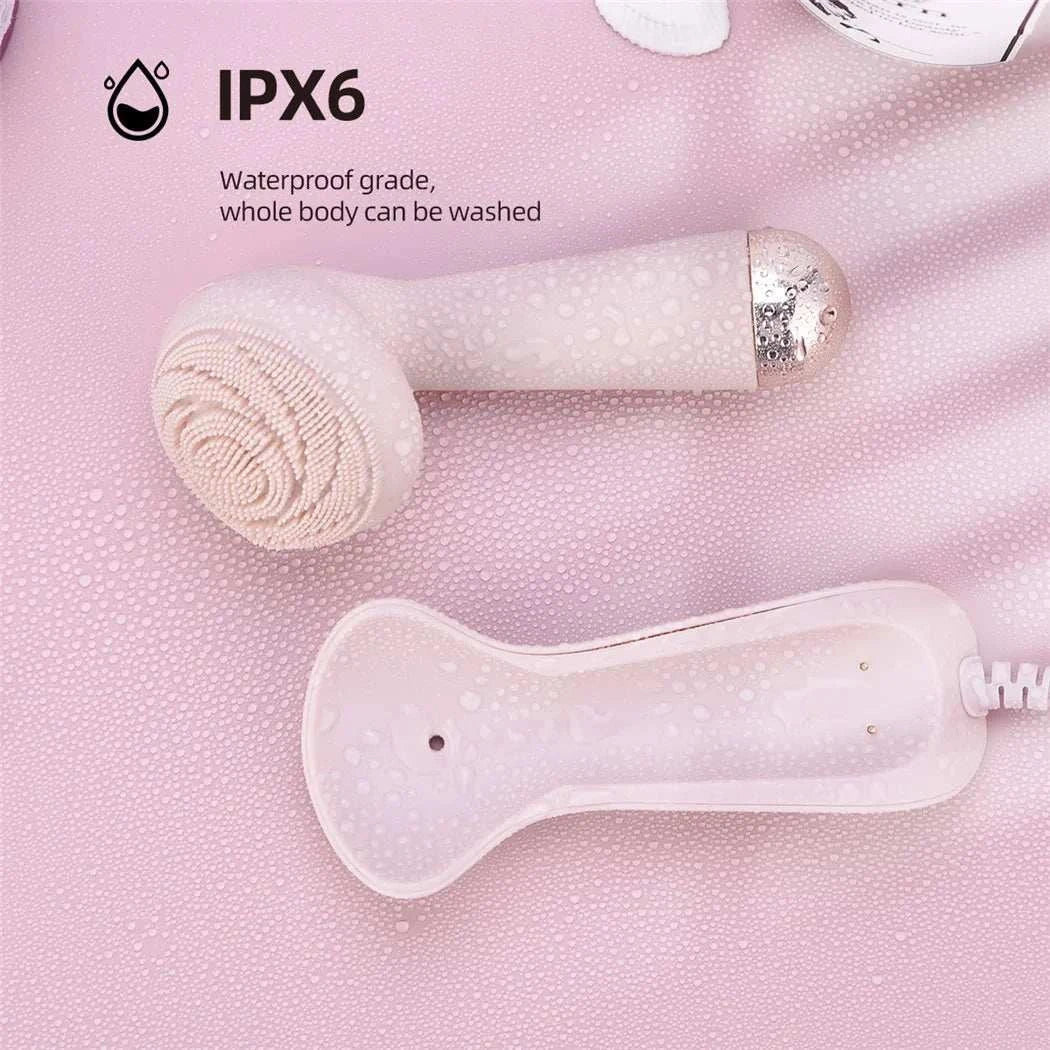 Electric silicone facial brush cleaner with waterproof design and charging dock on pink surface with water droplets