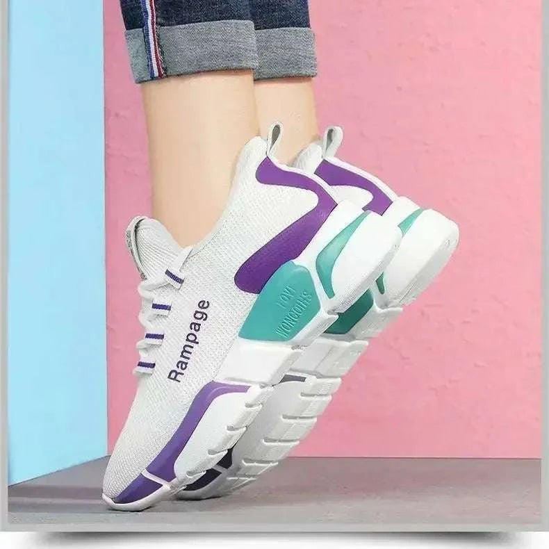 Lightweight and breathable women's shoes with stylish purple and teal accents, featuring durable soles and secure lace-up closure for versatile casual and sporty wear.