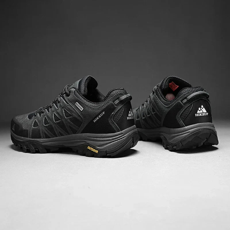 Black HIKEUP men's hiking shoes with durable, breathable design and rugged soles for outdoor trails and all-terrain performance
