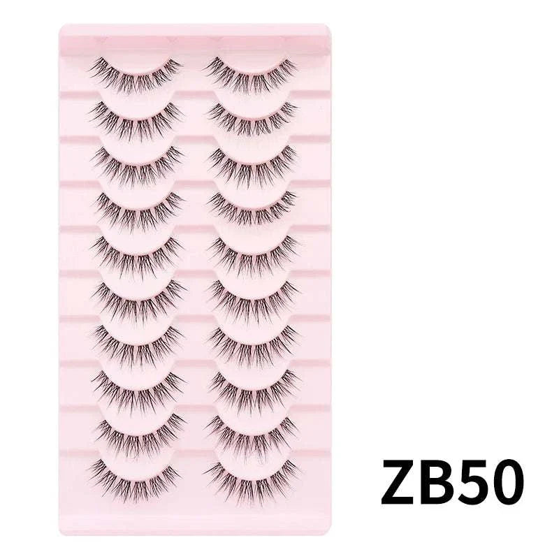 10 pairs of Natural Manga Full Strip Lashes in bulk, anime-inspired, lightweight, reusable, and voluminous false eyelashes for all eye shapes.