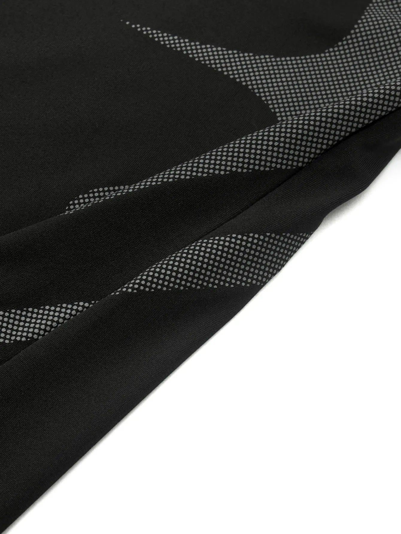 Close-up of black men's sports vest with breathable quick-dry compression fabric and digital print design