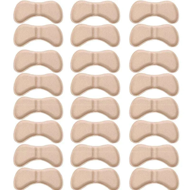 Set of 50 beige heel insoles patches for pain relief, cushioning, anti-wear protection, and universal shoe fit.