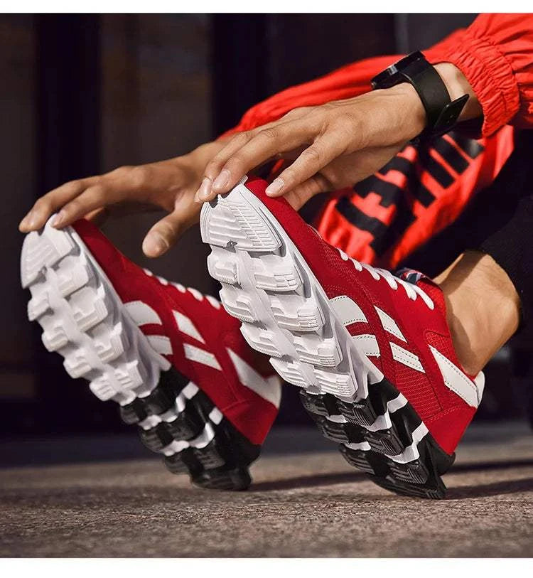 2025 new men's and women's running shoes in red with white accents, breathable mesh upper and anti-slip rubber sole.