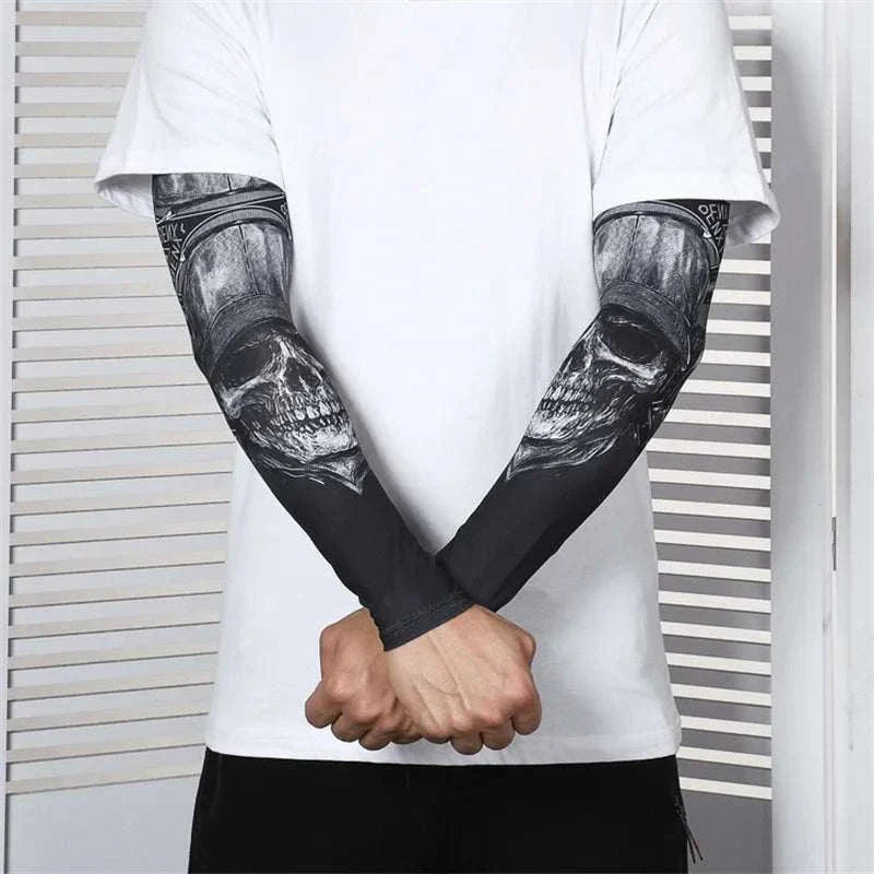 Black outdoor arm sleeves with skull tattoo design, providing UV protection, compression, and breathable comfort for sports and daily wear