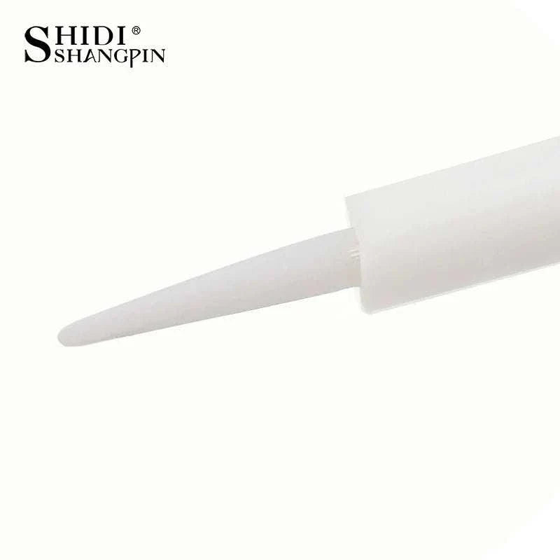 Glitter eyeshadow palette applicator brush with smooth, pointed tip for precise makeup application