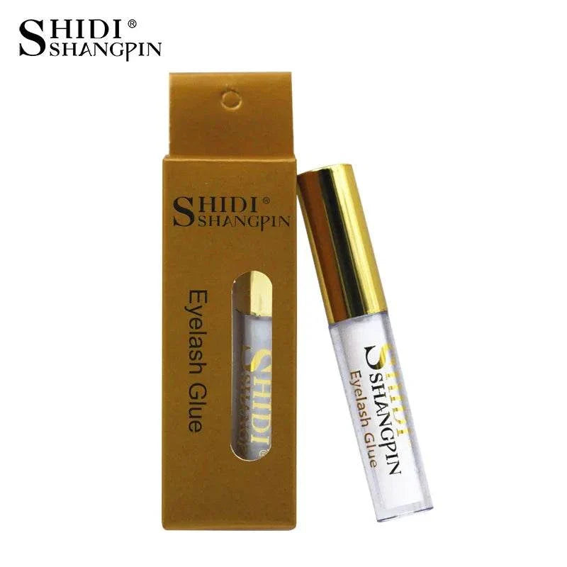 SHIDI SHANGPIN eyelash glue with gold cap and brown packaging box