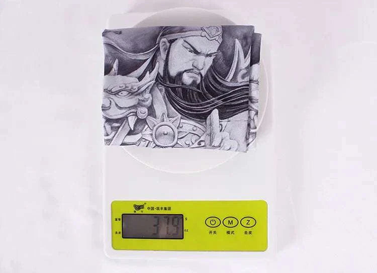 Lightweight tattoo cover outdoor arm sleeves on a digital scale showing 37 grams