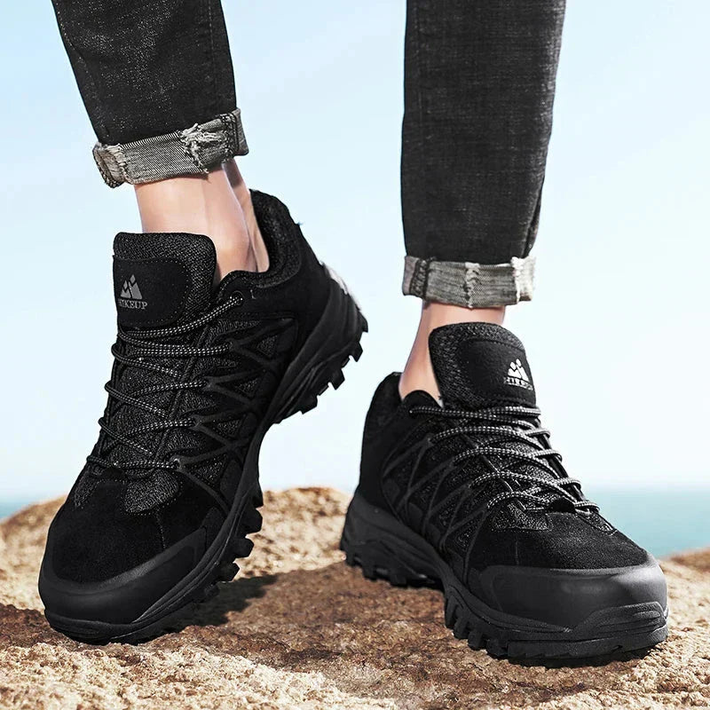 HIKEUP men's black hiking shoes with durable construction and superior grip on rugged terrain