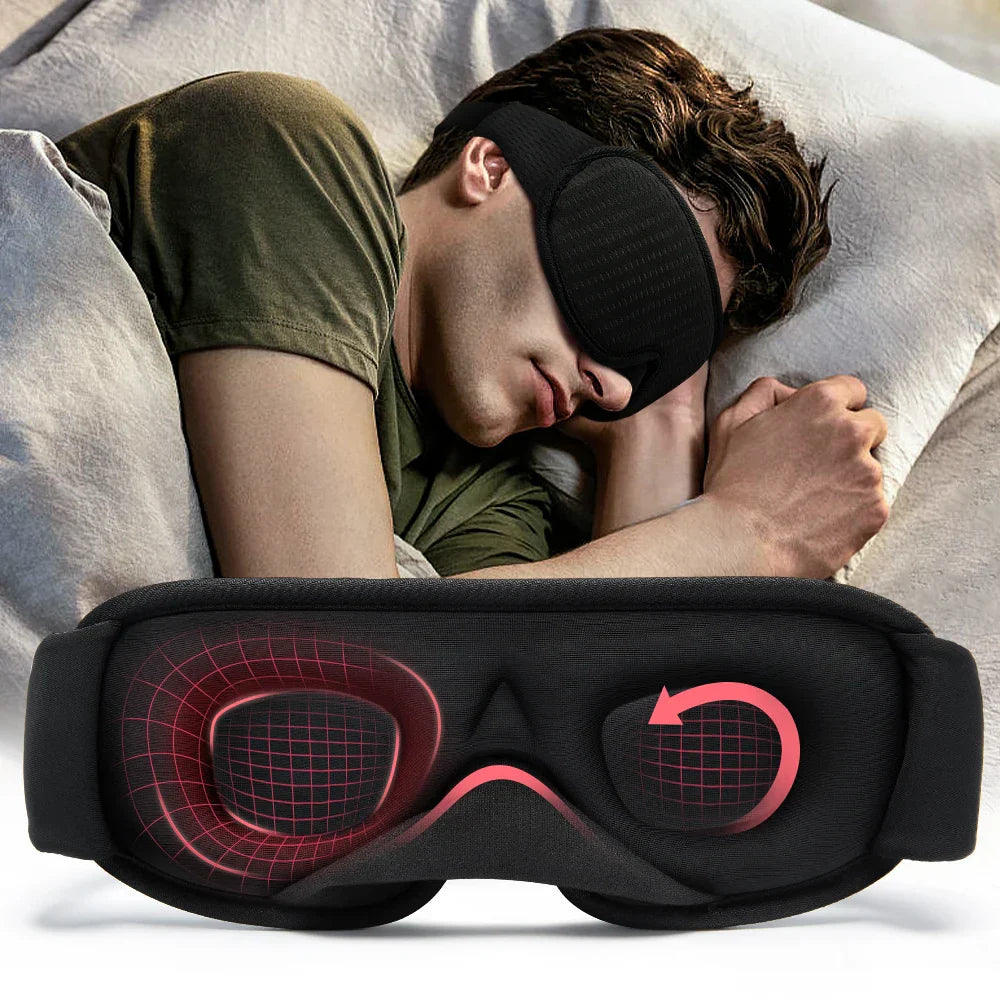 Man sleeping wearing black 3D Sleeping Mask with ergonomic design blocking out light for restful sleep
