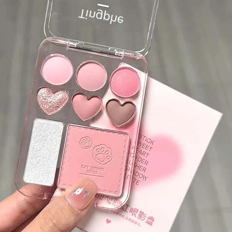Compact 8-color pink orange eyeshadow palette with heart-shaped pans, blush, highlighter, and shimmering shades for radiant makeup looks