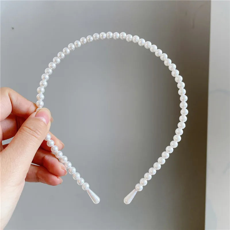 Modyle full pearl hairband with elegant floral design and elastic fit for women and girls