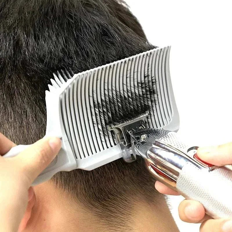 Barber fade comb used with hair clippers for precise fade haircut and flat top styling