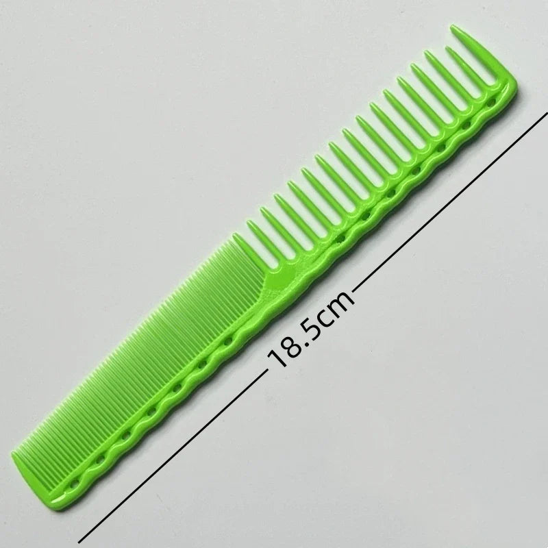Green professional haircut comb with dual teeth spacing and ergonomic grip measuring 18.5 cm