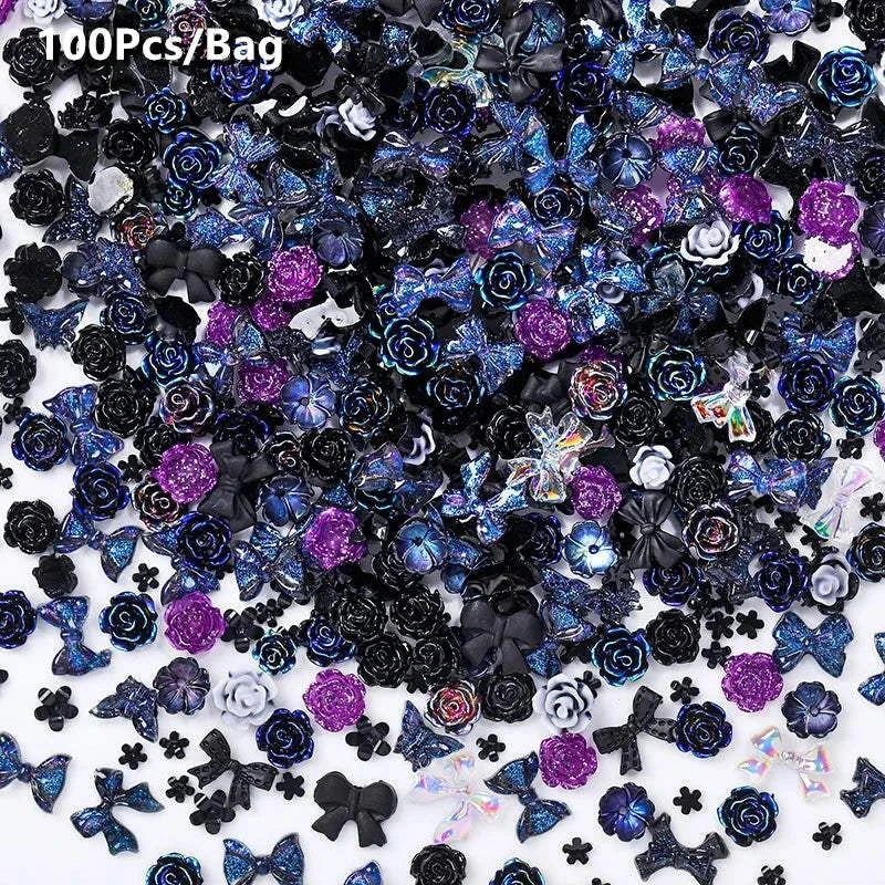 Assorted decorative rhinestones and nail art embellishments in black, purple, and iridescent colors for use with BORN PRETTY 10g Gel Nail Glue.