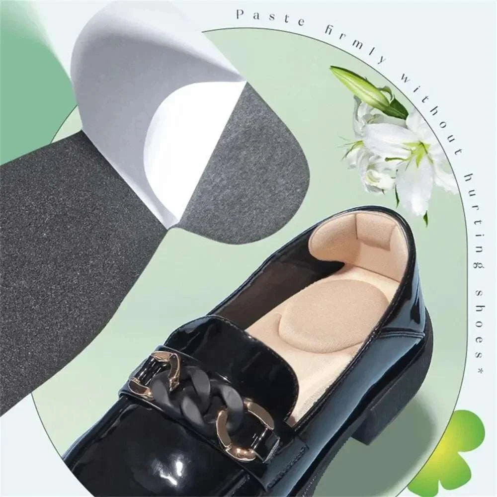 Black memory foam high-heel insoles inside a black shiny women's shoe with anti-slip backing and cushioned support