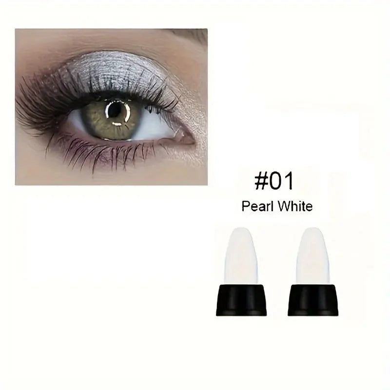 Close-up of eye with pearlescent pearl white glitter eyeliner applied, showcasing shimmery metallic finish from 16-color pearlescent glitter eyeliner set