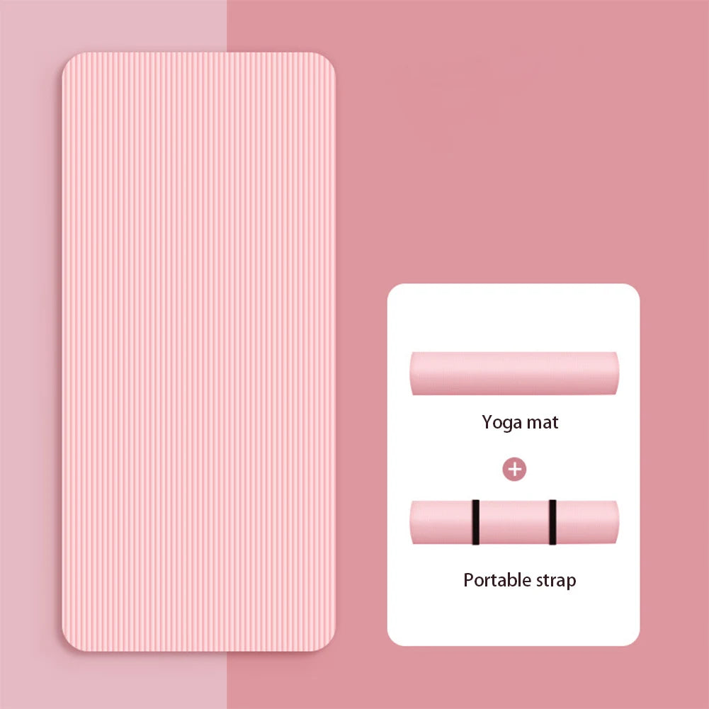 Pink non-slip yoga mat with textured surface and portable strap for easy carrying