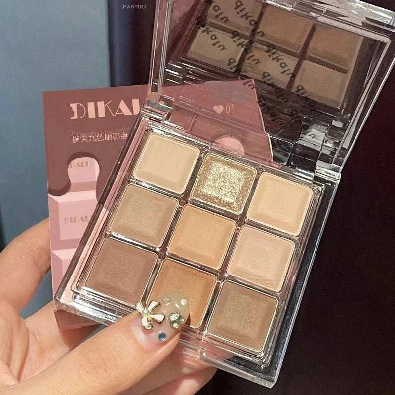 Black Pink Smoky Eye shadow palette with matte and pearlescent neutral chocolate shades in a compact case with mirror