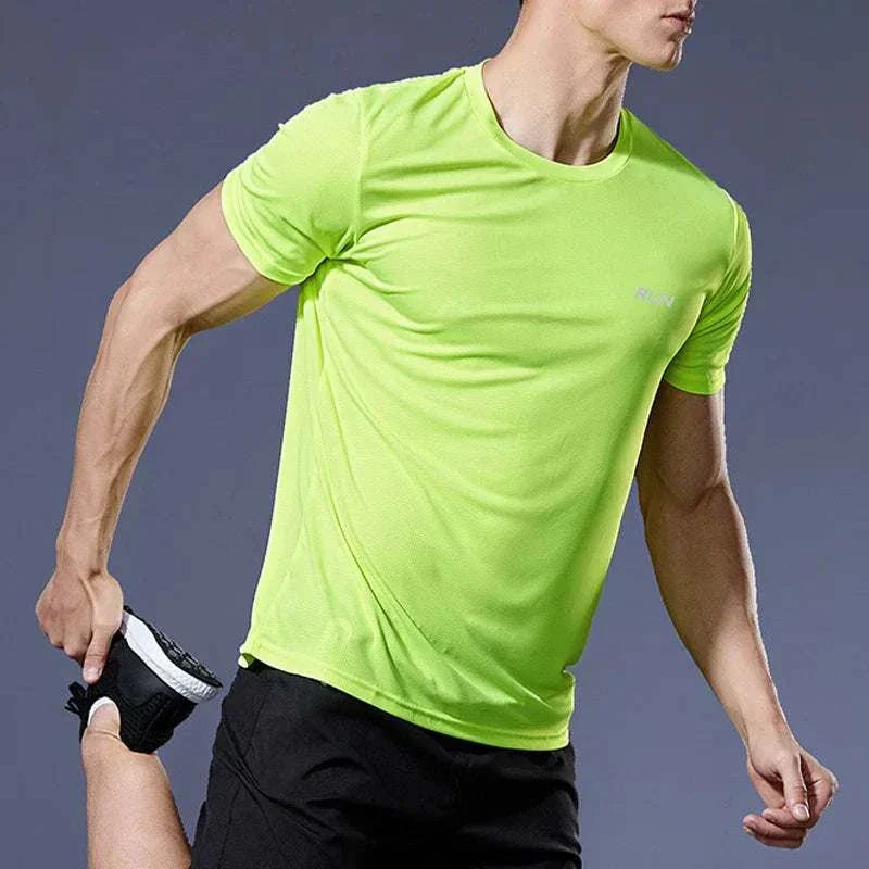 Men’s lime green quick-dry compression sport t-shirt worn during stretching exercise