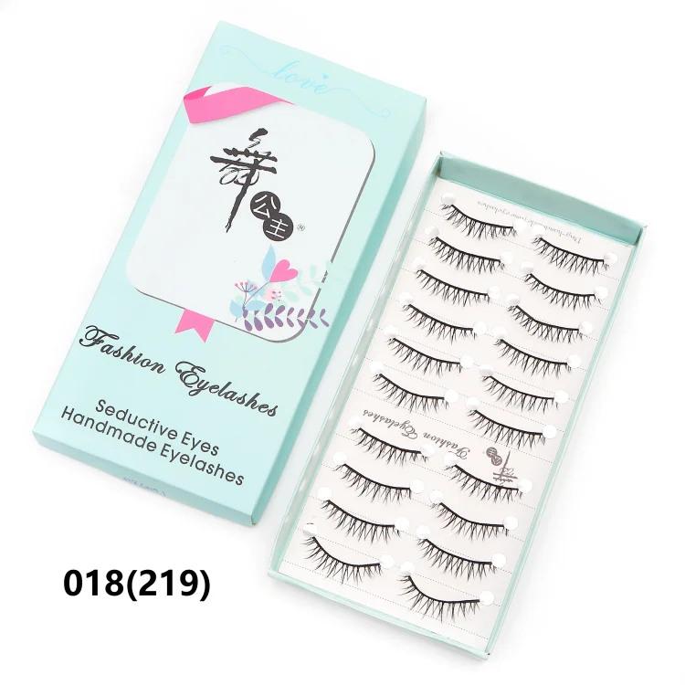 10 pairs of Natural Manga Full Strip Lashes in a mint green box, lightweight and reusable anime-inspired false eyelashes for voluminous and natural eye enhancement.