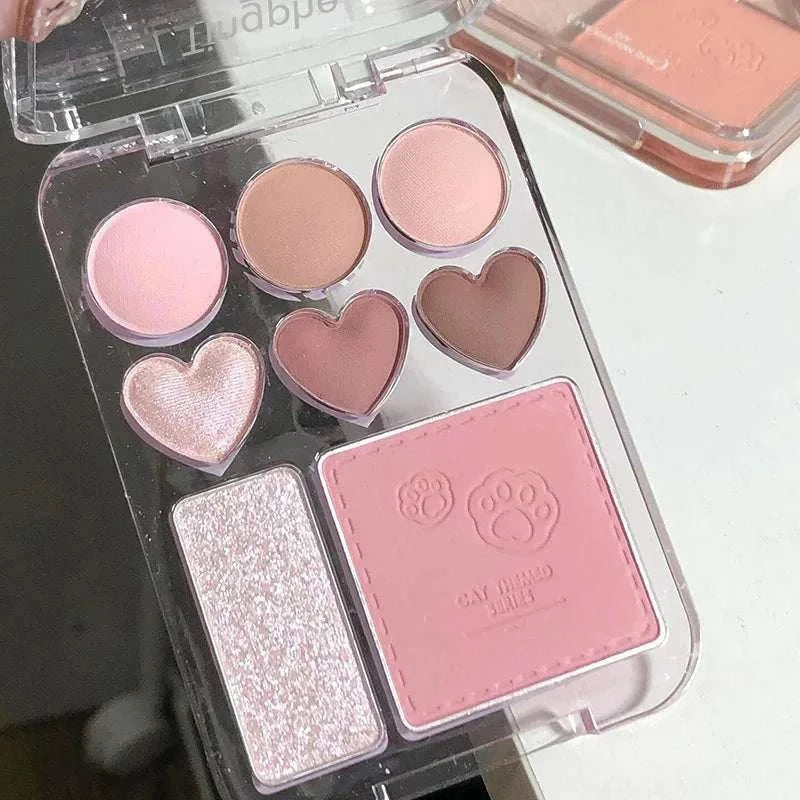 8-Color Pink Orange Eyeshadow Palette with heart-shaped shades, blush, and highlighter in pink and peach tones