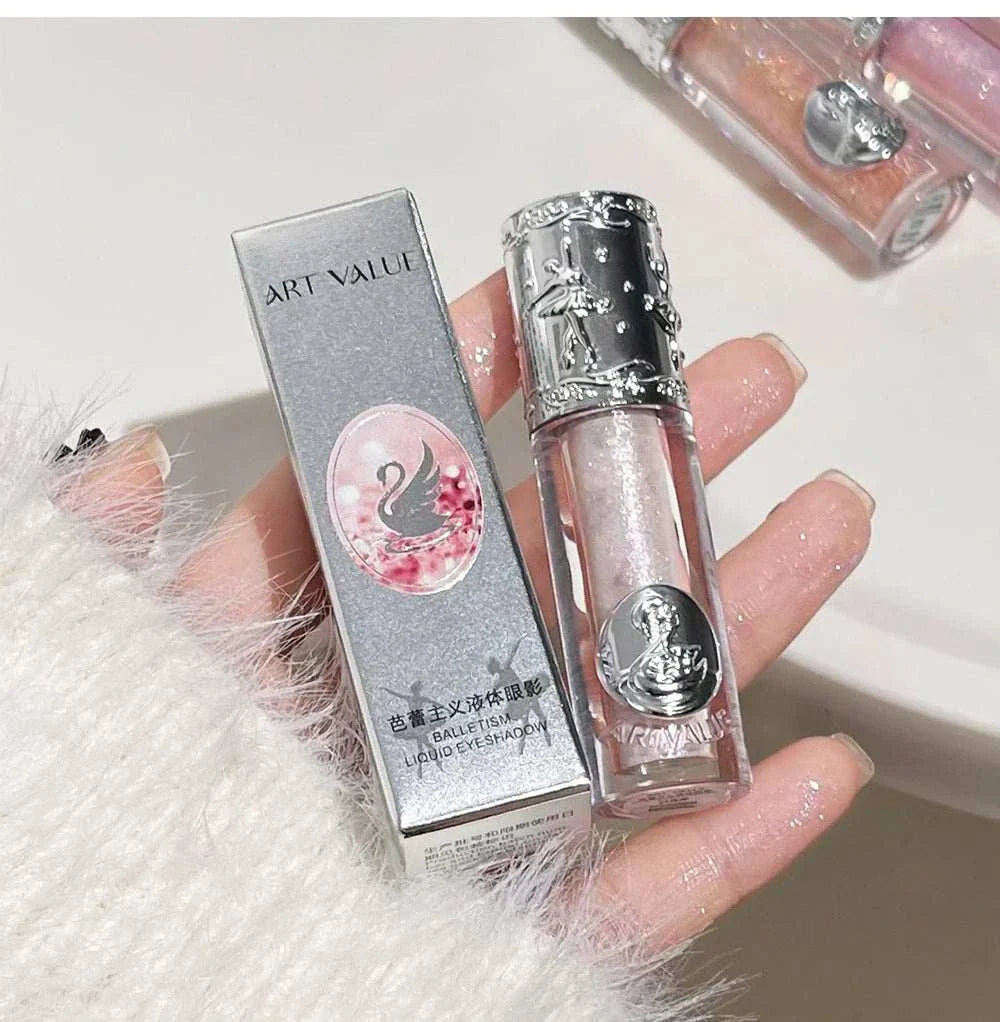 Balletism Liquid Eyeshadow with delicate fine shimmer in elegant silver packaging, lightweight and buildable for a radiant, long-lasting glow.