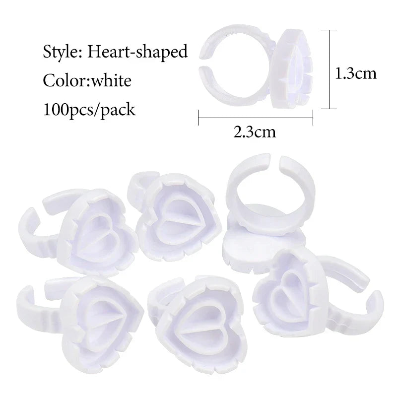 100 pcs white heart-shaped disposable glue ring cups for lash extensions and tattoo pigments, wearable and hygienic