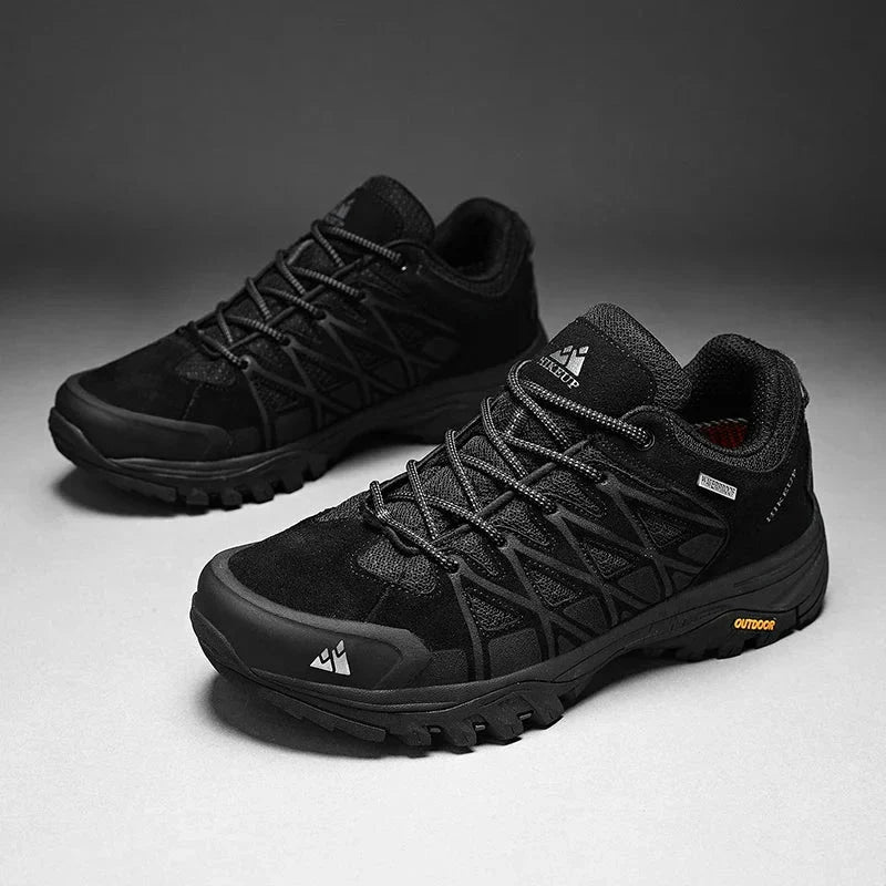 Men's hiking shoes in black with durable construction, superior grip, breathable mesh, and cushioned midsoles for outdoor adventures.