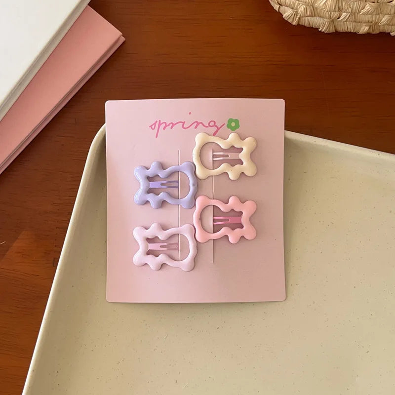 4pcs colorful geometric mini hair clips set on pink card for girls