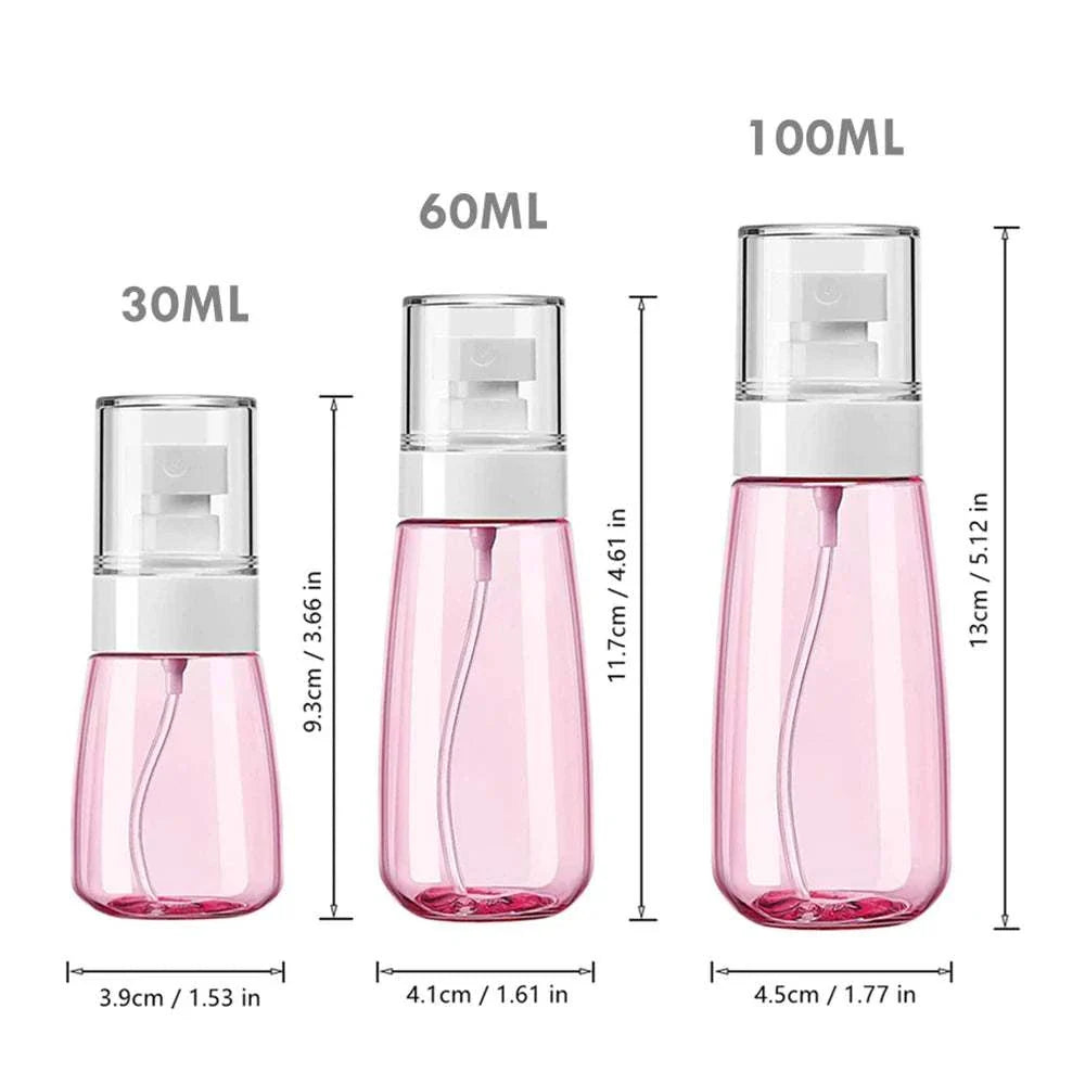 Set of three pink refillable travel spray bottles in 30ml, 60ml, and 100ml sizes with clear caps and fine mist nozzles.