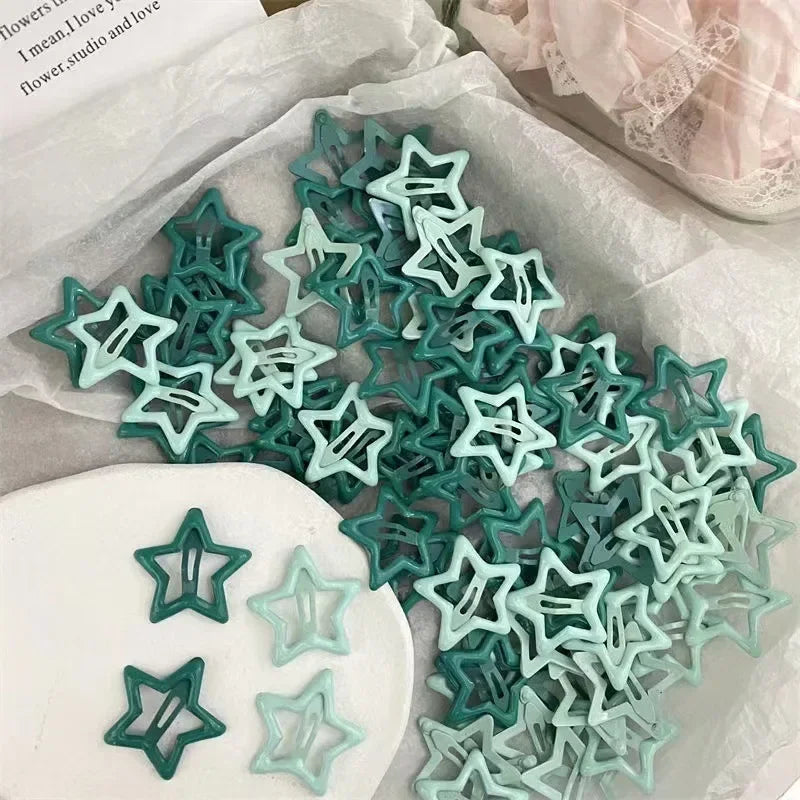 Colorful Kawaii star-shaped snap barrettes in shades of green and teal for Y2K style hair accessories