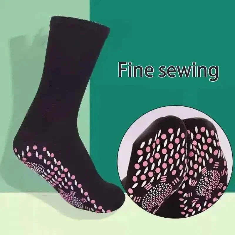 Non-slip black health care socks with pink grips and fine sewing detail