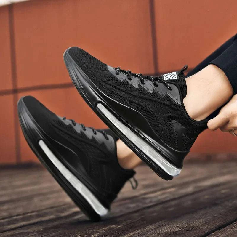 Black breathable unisex sneaker with cushioned sole and lace-up closure ideal for walking and running
